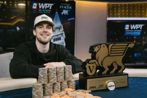 WPT Venetian Champion Portrait – Nick Seward with Trophy and Chips